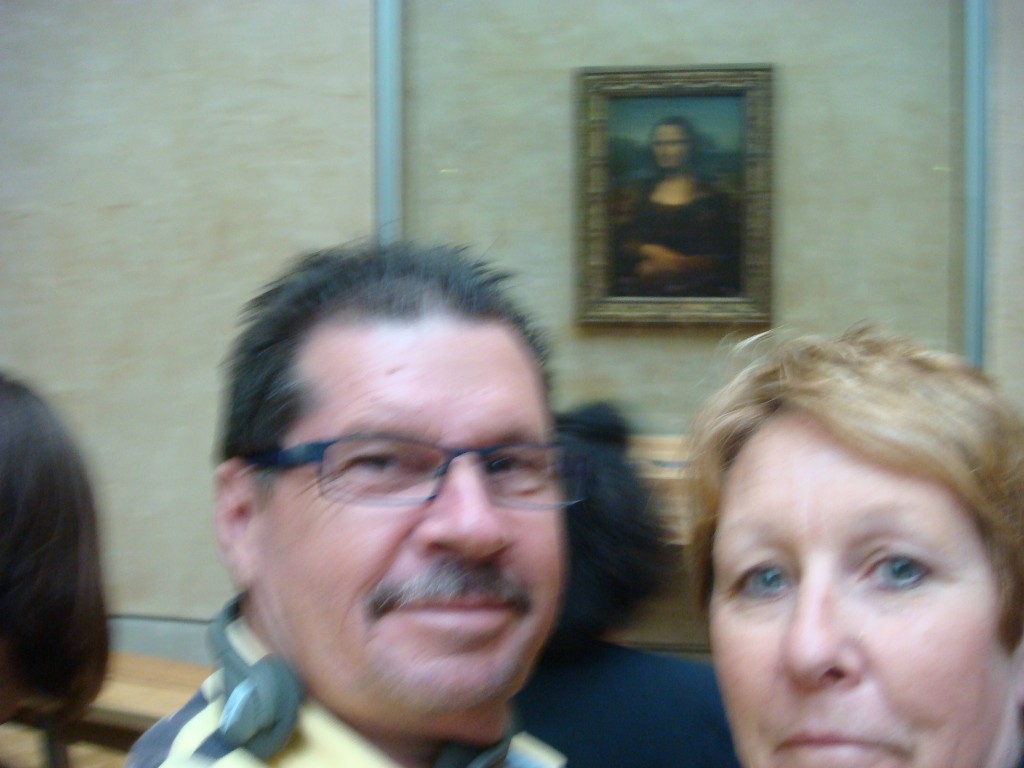 A quick selfie with the Mona Lisa, France.  2011