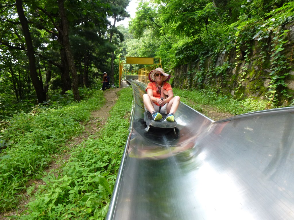 Tobogganing down from the Great Wall, China.  2013
