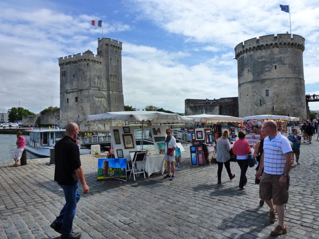 The twin towers of the forts guarding the old port of La Rochelle, France. 2014