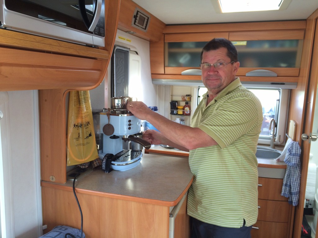 Making freeway coffees in an Aire (we love our inverter), France. 2014