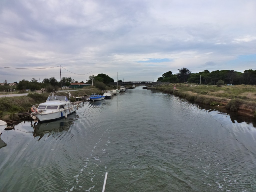 The tree lined Midi Canal has disappeared as we approach the Etang, France.  2014