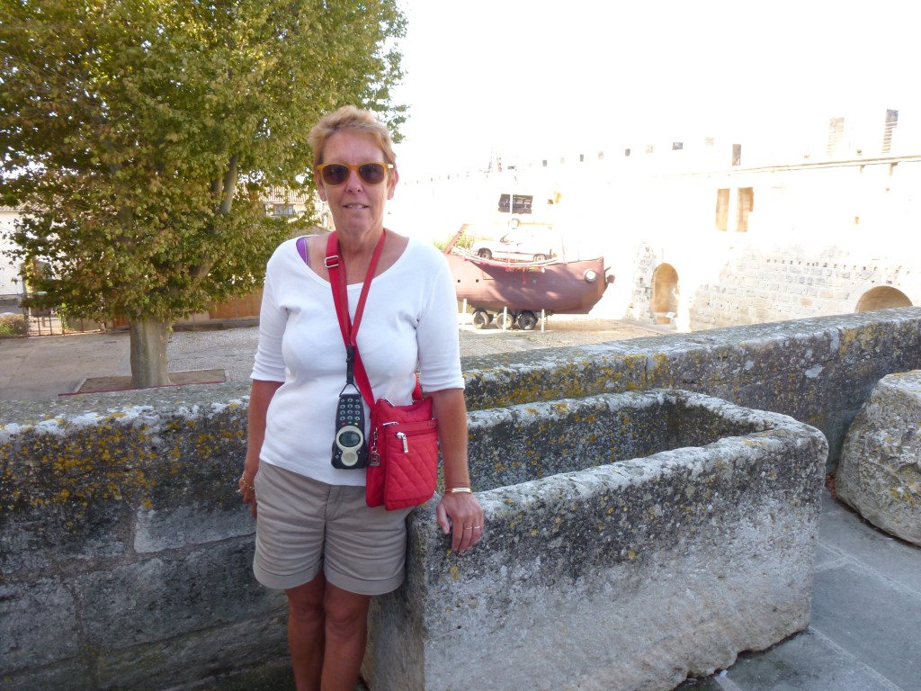 Pam's looking for the hot tap on the 14th century bath tub, Aigues-Morts, France.  2014