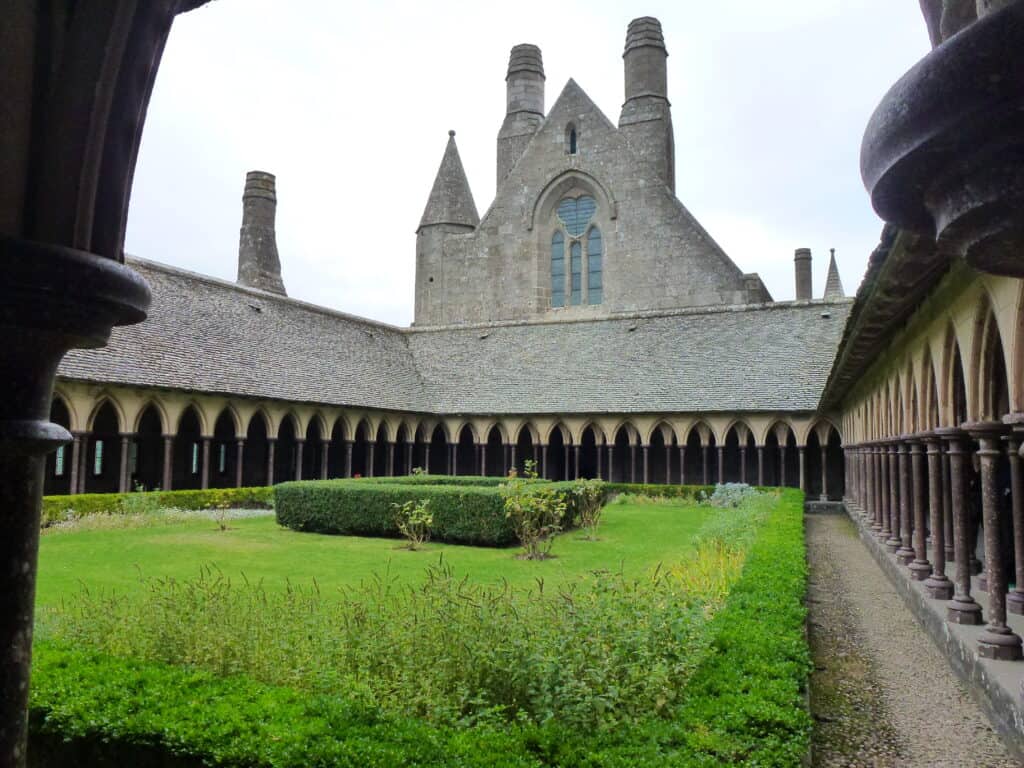 The Abbey Cloisters are a tranquil retreat with stark stonework of the rest of the building