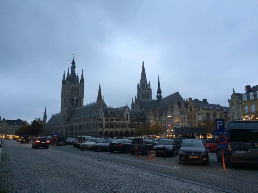 Late afternoon in Ypres, across the square. The Cloths Hall and Cathedral in the background.