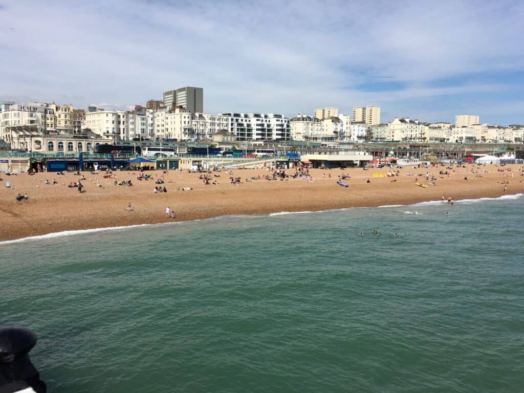 Looking back at Brighton from the pier, the day was starting to warm and to our surprise there were people swimming.